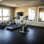 Van woonkamer naar workout: zo bouw je jouw ideale thuis sportschool